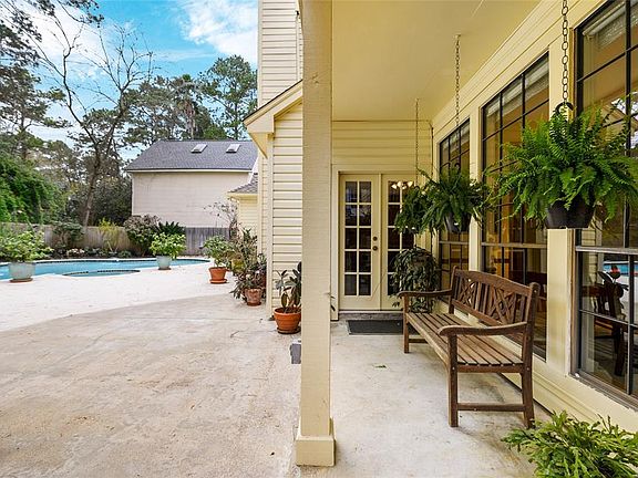 Covered patio and extra decking for tanning by the pool.