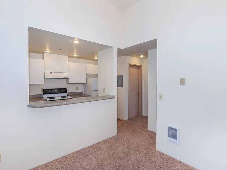 A Classic 1 Bedroom 1 Bath Kitchen & Living Room at Brookhaven Apartments in Federal Way, Washington