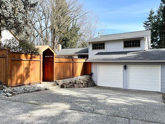 This spacious home has a large 2 car garage and extra driveway parking.