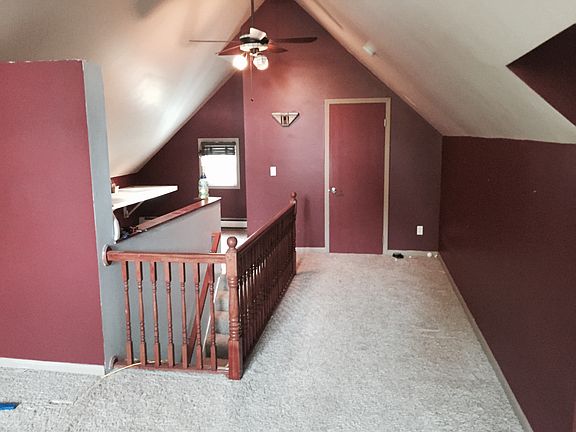 3rd floor living room with 1/2 bath