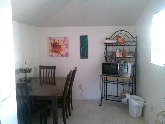 cheeerful dining room with lots of light