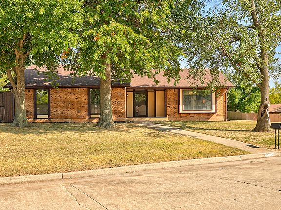 Corner lot with mature trees