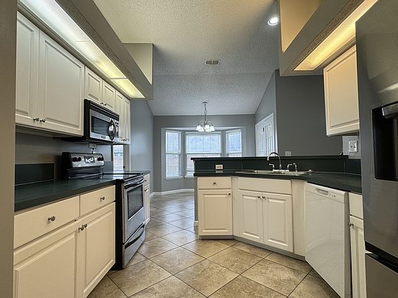 Galley kitchen with so much counter spacee