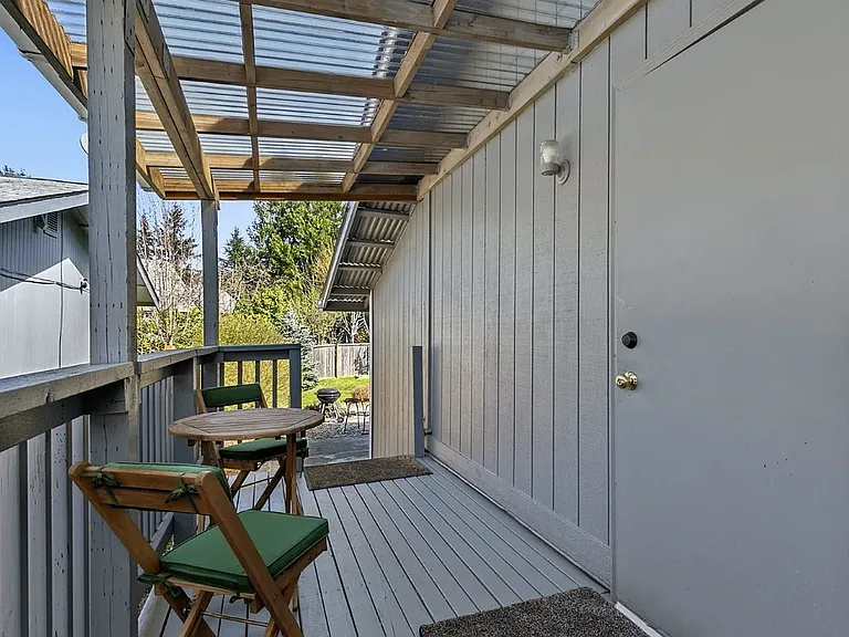 A little balcony at the side of the house for you to relax outdoors.