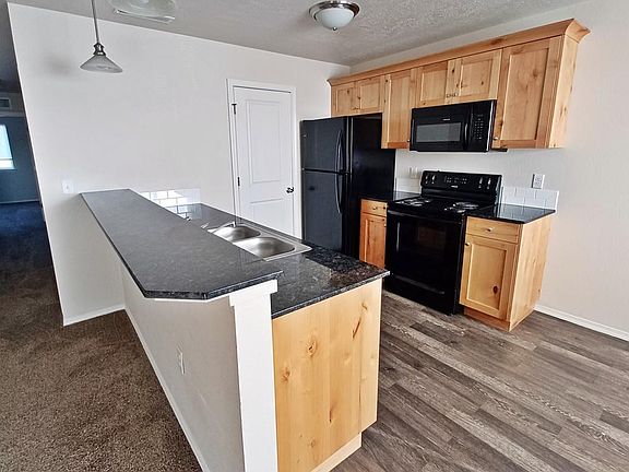 Kitchen with microwave and pantry