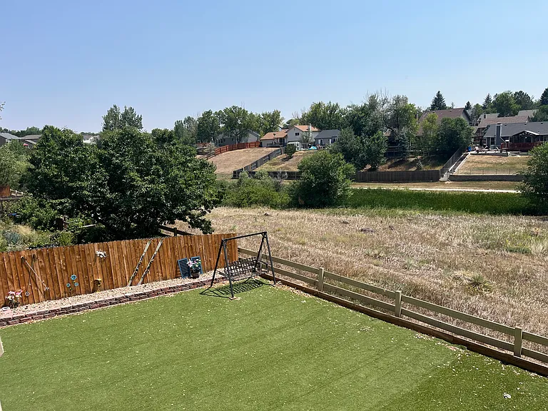 Large, fenced backyard