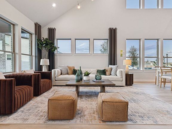 Living Room in the Monet II home plan by Trophy Signature Homes - REPRESENTATIVE PHOTO