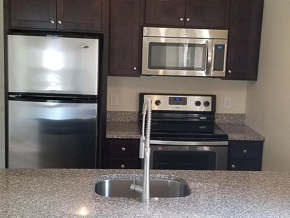 Renovated kitchen with stainless steel appliances
