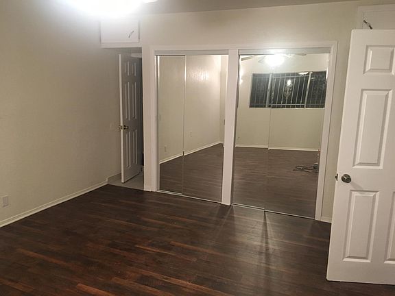 master bedroom, door on left is to restroom, door on the right is to laundry room. (more pictures to come)