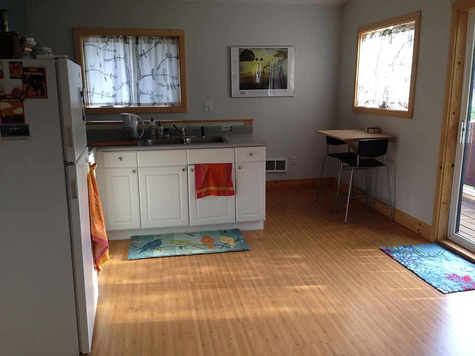 Functional kitchen with full size electric range and oven.