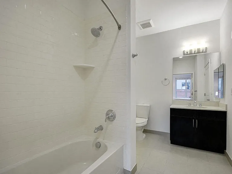 Luxury bathrooms with tiled bath surrounds