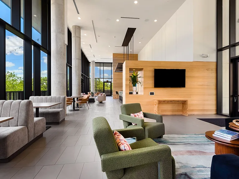 Resident Social Space Featuring Sectional Seating and Media Setup