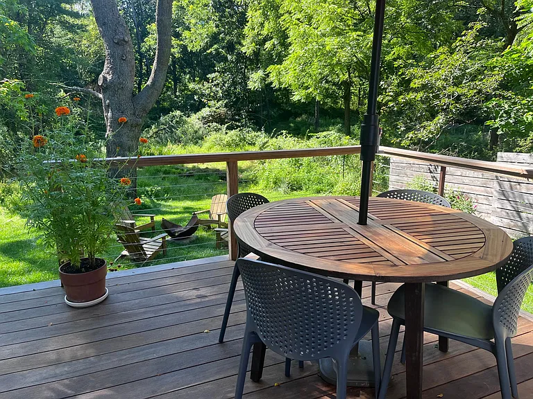 Back deck - looks out onto preserved bucolic land.