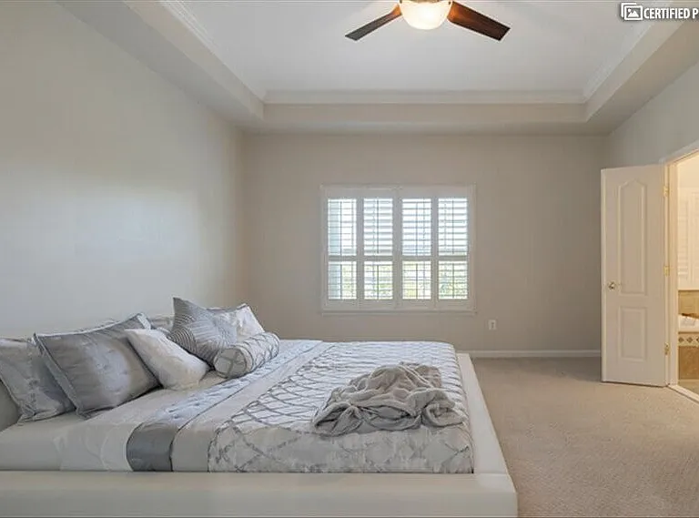 Master suite with private bathroom.