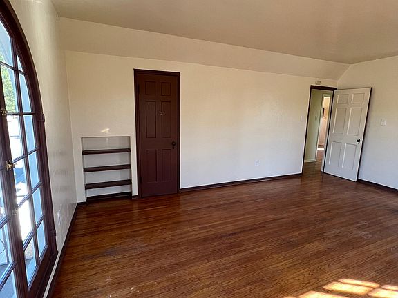 Built in shelf unit and sizeable coat closet
