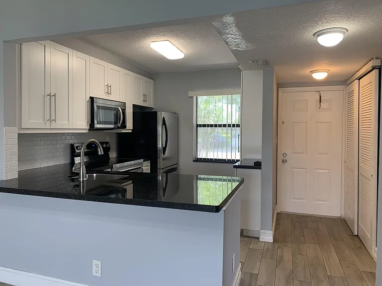 10011 Winding Lake Rd #101 — Photo 2