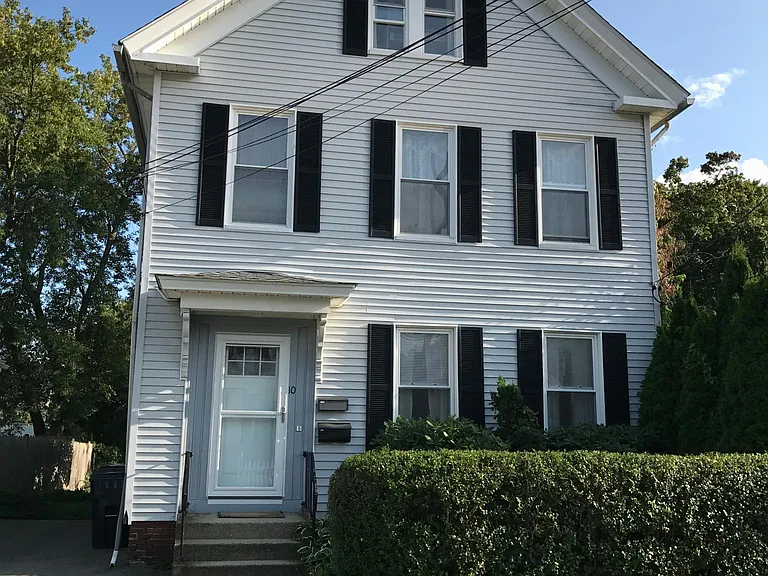 Apartment on 1st floor. Parking for 1 car on left.