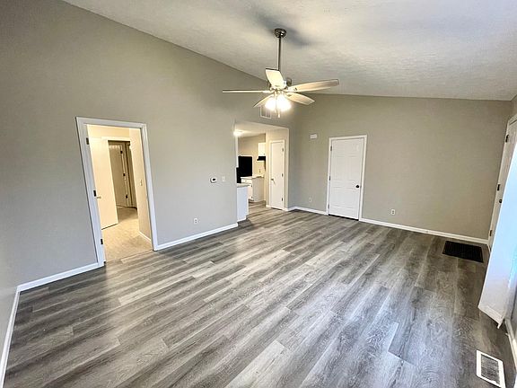 Living Room, opens to kitchen and guest full bath