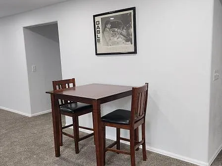 Lower area dinning or work table area.