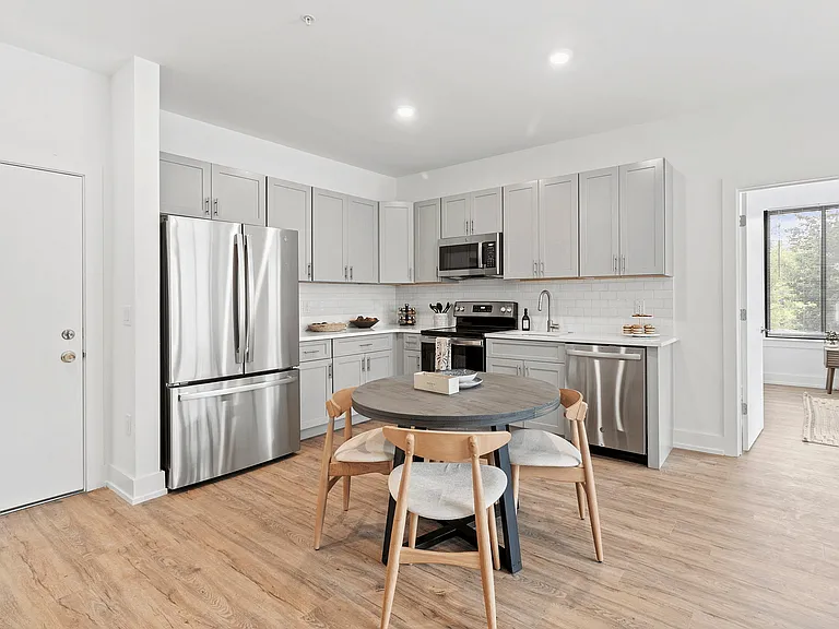 Experience the elegance of this contemporary kitchen, perfect for culinary enthusiasts.