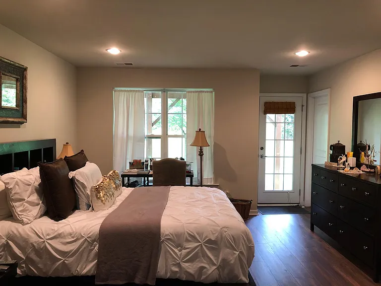Lower level, finished walkout basement can be used as bedroom or extra family room