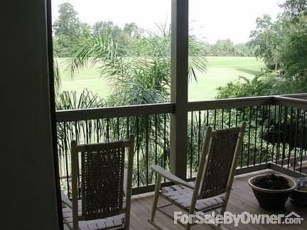 Upper rear veranda overlooking levee