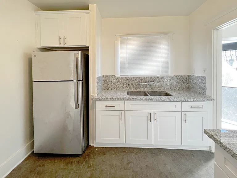 Kitchen - refrigerator & stove included