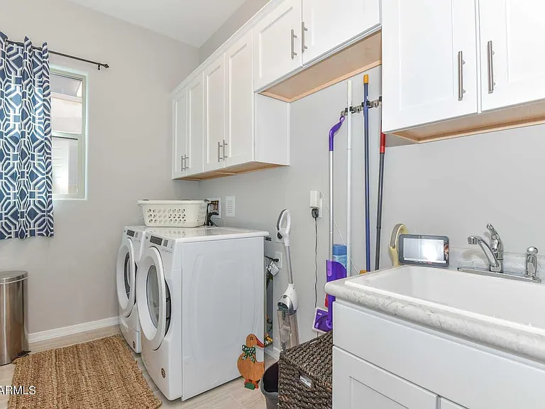 9661 W Patrick Ln — Photo 39