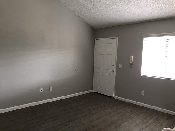 Plenty of light from the picture window. Notice the security intercom to the right of the door.