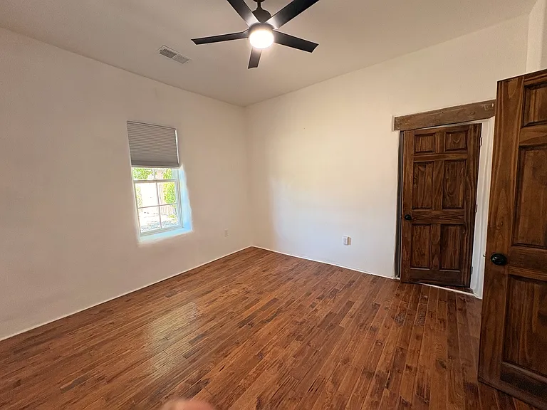 Bedroom in SW corner.