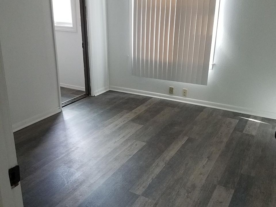 bedroom 1 with door to bathroom