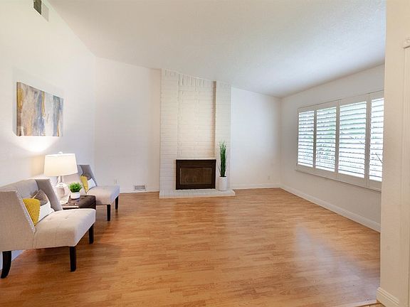 The shutters, laminate floors and fresh interior paint create a space that is filled with natural light.