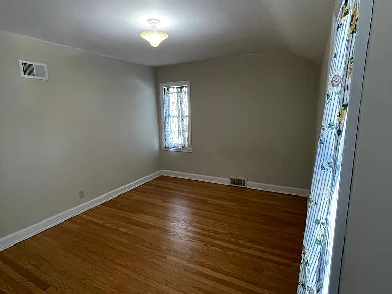 Second floor back bedroom (from balcony door)