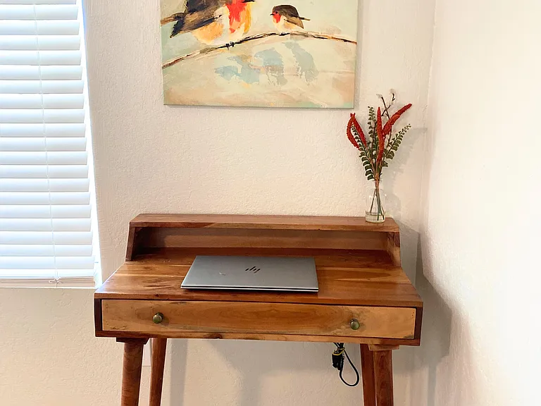 Dedicated workspace with access to wi-fi. This includes an office chair.