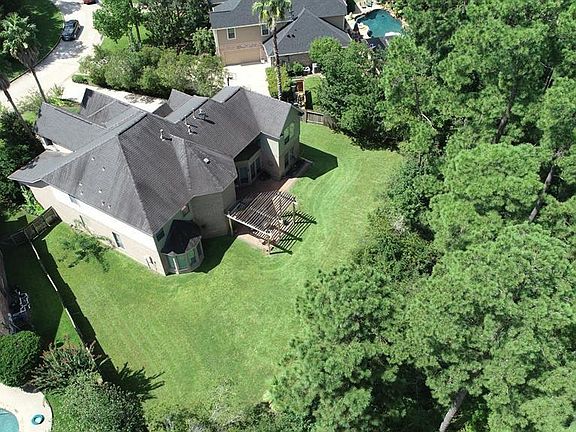 This aerial view highlights the lush landscape and ideal location