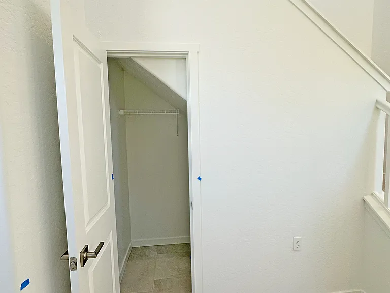 Closet under stairs