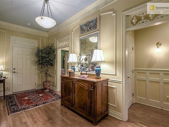 Formal entry leads to master bedroom and guest bedroom/guest bath on left.