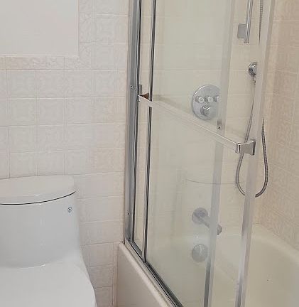 Bathroom with tub and shower