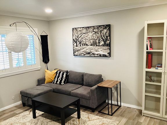 Cozy living room, sofa with storage ottoman