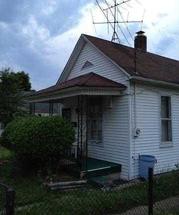 LONG FENCED  DRIVE WAY TO AT