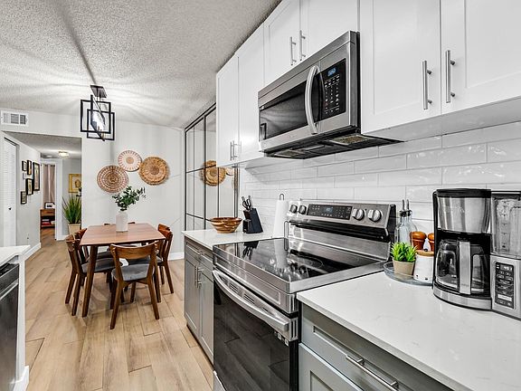 4th image of 9729 Hammocks Boulevard #101e