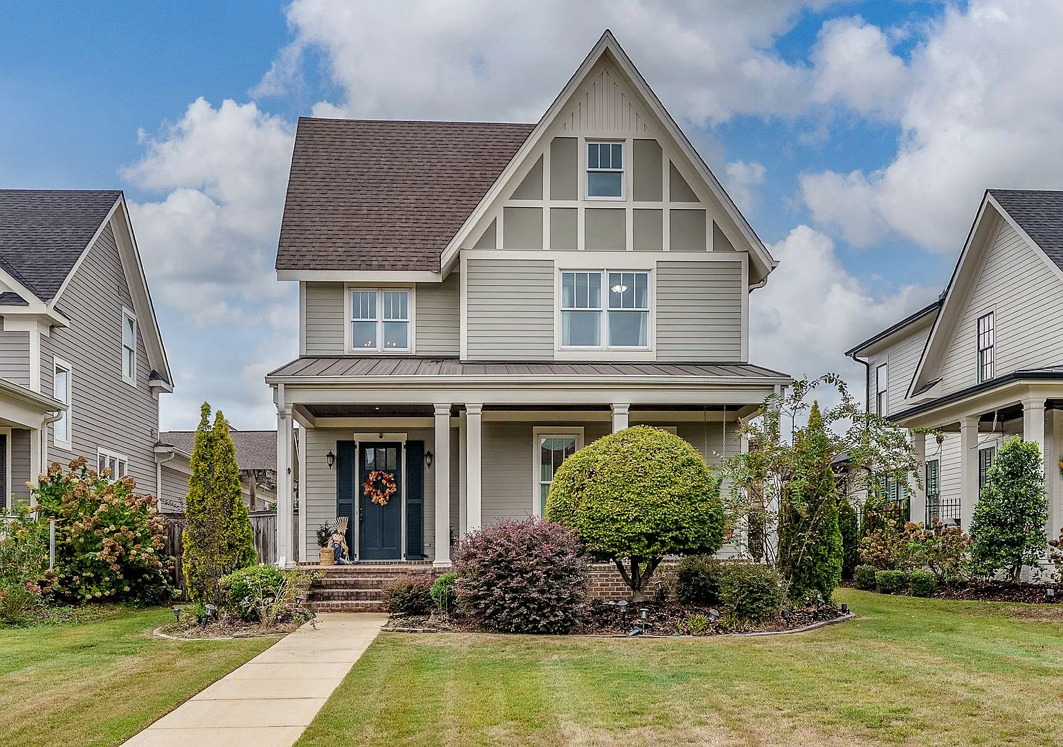 4 bedroom home located in The Townes of North River — Photo 1