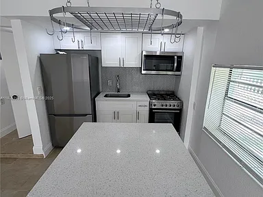 9064 COLLINS AVE ONE BEDROOM