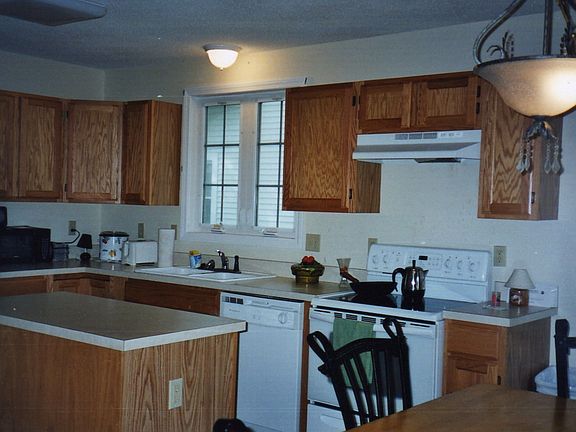 Open modern kitchen with pantry