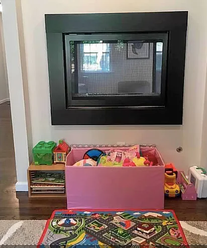 Fire place that shows the den/office