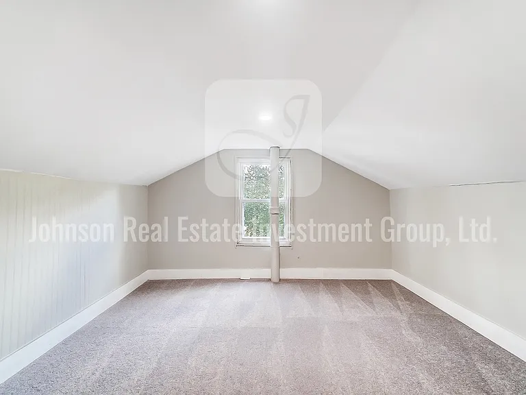 Versatile bonus room with lower ceiling _ great for a playroom or office.
