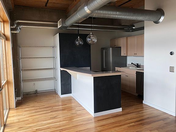 Kitchen with Electric Stove, Fridge, Dishwasher, Sink + Garbage Disposal. Nest Thermostat.