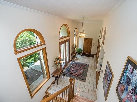 A view from highlights the spaciousness of the entry and all the natural light.