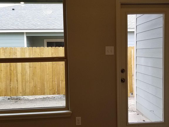 Sample of side patio view. Fence included.