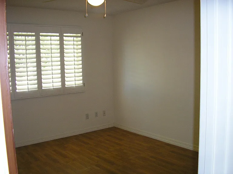 Bedroom w walkin closet and shelving system upgrade
